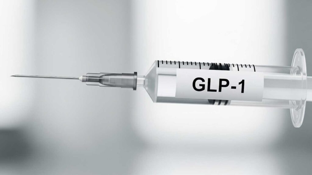 Close-up of a GLP-1 injection, representing one of the core treatments used in doctor-supervised weight loss programs. 